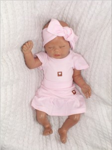 Różowa spódniczka niemowlęca.  Bawełniana spódniczka dla niemowlaka.