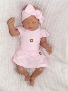 Różowa spódniczka niemowlęca.  Bawełniana spódniczka dla niemowlaka.