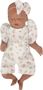 Muślinowy kombinezon niemowlęca z falbankami. Przewiewny dziewczęcy rampers. Kombinezon na lato z opaską dla niemowlaka. Biały rampers muślinowy w kwiaty dla małej dziewczynki.