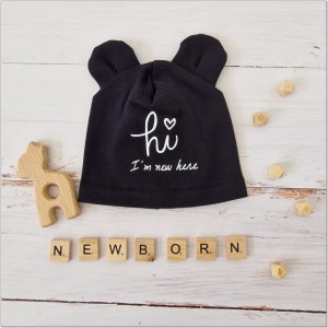 Bawełniana, elastyczna czapeczka dla noworodka. Czapeczka na wyjście ze szpitala dla niemowląt.  Czarna czapeczka z uszkami dla noworodka.