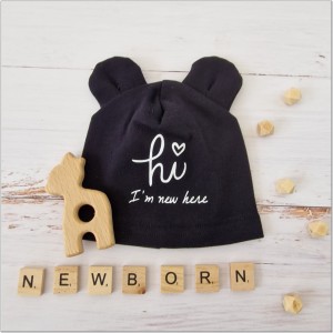 Bawełniana, elastyczna czapeczka dla noworodka. Czapeczka na wyjście ze szpitala dla niemowląt.  Czarna czapeczka z uszkami dla noworodka.
