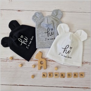 Bawełniana, elastyczna czapeczka dla noworodka. Czapeczka na wyjście ze szpitala dla niemowląt.  Czarna czapeczka z uszkami dla noworodka.
