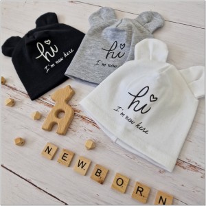 Bawełniana, elastyczna czapeczka dla noworodka. Czapeczka na wyjście ze szpitala dla niemowląt.  Czarna czapeczka z uszkami dla noworodka.