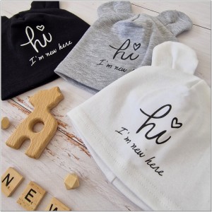 Bawełniana, elastyczna czapeczka dla noworodka. Czapeczka na wyjście ze szpitala dla niemowląt.  Czarna czapeczka z uszkami dla noworodka.