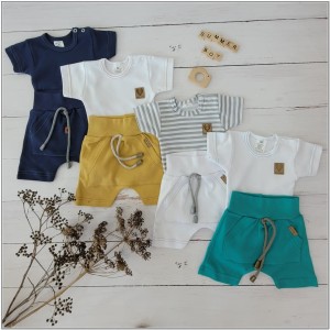 Biało-zielony komplet na lato dla niemowlaka. Body, spodenki na lato dla noworodka. Niemowlęcy, bawełniany zestaw na lato.